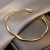 Elegant Open Bracelet in Gold